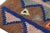 Hand-knotted in wool and originating from Morocco circa 1950-1960, this 2x8 vintage Moroccan rug is an extremely rare...