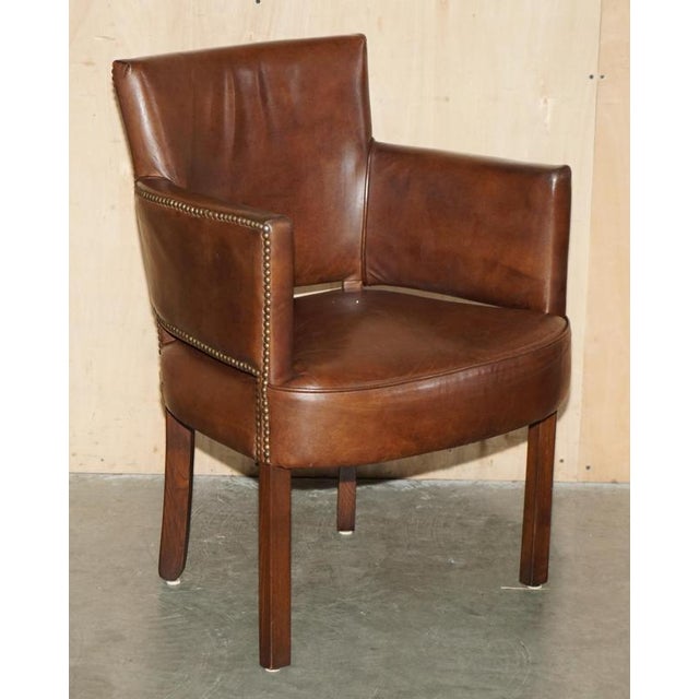 Lovely suite of Four Heritage Brown Leather Halo Barrel back occasional or dining chairs A very collectable suite of...