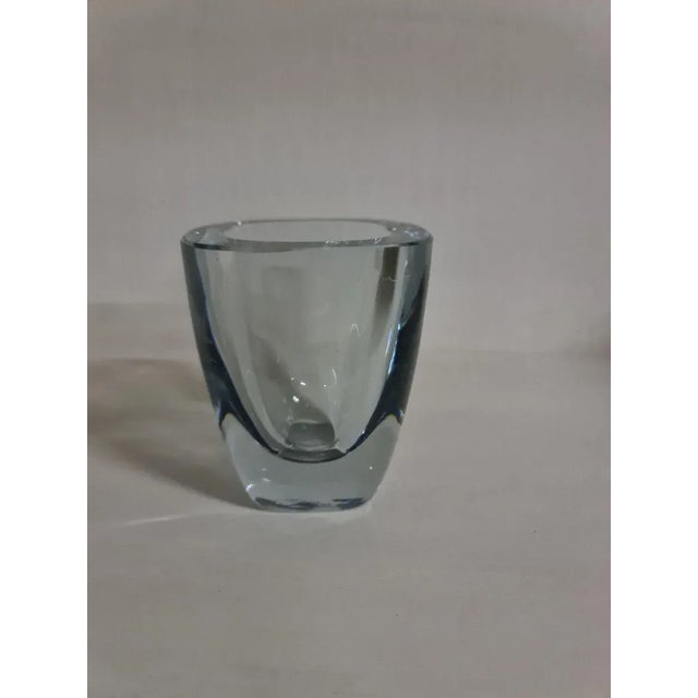 Heavy blown rectangular vase with rounded corners in strömbergshyttan's signature blue-silver glass. Sweden, circa 1950s....