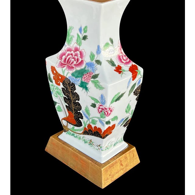 from the Vista Alegre Porcelain Factory (founded 1824) each rectilinear vase with flared neck above a tapering body ending...