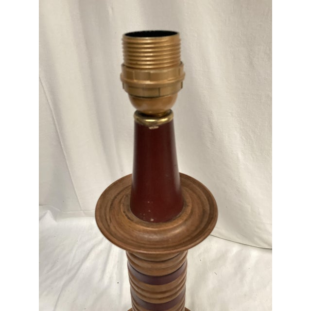 Very beautiful leather and wood covered lamp / Lampshade not supplied / Dimensions given without lampshade This piece is...