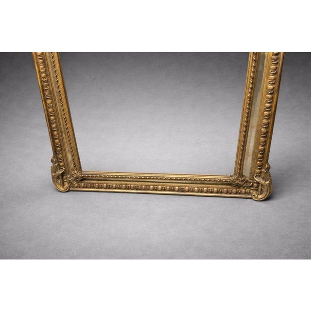 This exceptional 19th-century Louis XV giltwood and gesso mirror, dating to the circa 1870s, is a superb example of French...