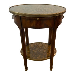 Eglomise by Theodore Alexander Oval Side Table With Brass Railing & Mottled Gold With Glass Surface For Sale
