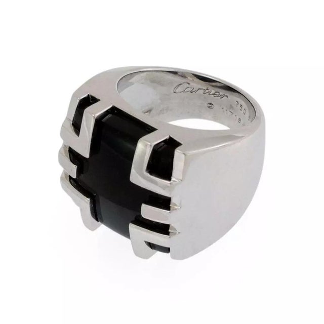 This authentic and bold ring is by Cartier from the Le Baiser du Dragon Collection, in a polished finish this ring is...