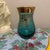 Elevate your home bar with this exquisite piece of Italian-inspired artistry. This hand-blown cordial glass features a...