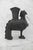 Patinated bronze Chinese Zun vessel in form of a Phoenix or heavenly rooster bird, inspired by ancient Shang and Zho...