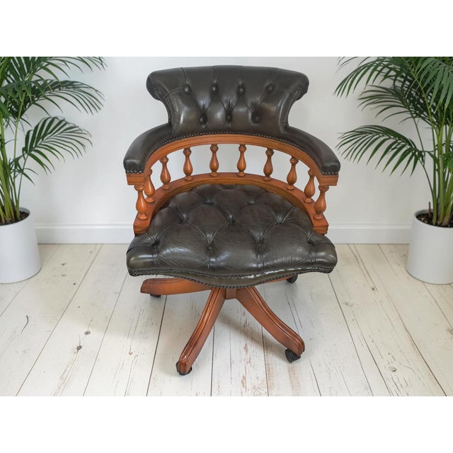 This is an exquisite vintage ring mekanikk captain’s chair made in norway, perfect as an office or desk chair, featuring...