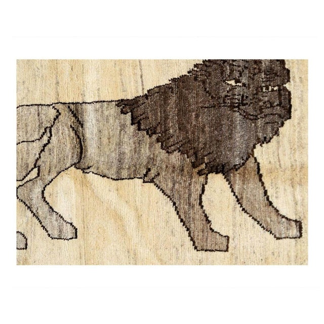 This Qashqai Lion carpet features a Kashkouli style weave. Highlighting the powerful imagery of a prowling Lion, the...