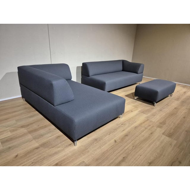 Brand: Leolux Model: Faya Lobi (REFURBISHED) Type: Corner sofa Color: Gray Including stool. This beautiful timeless...