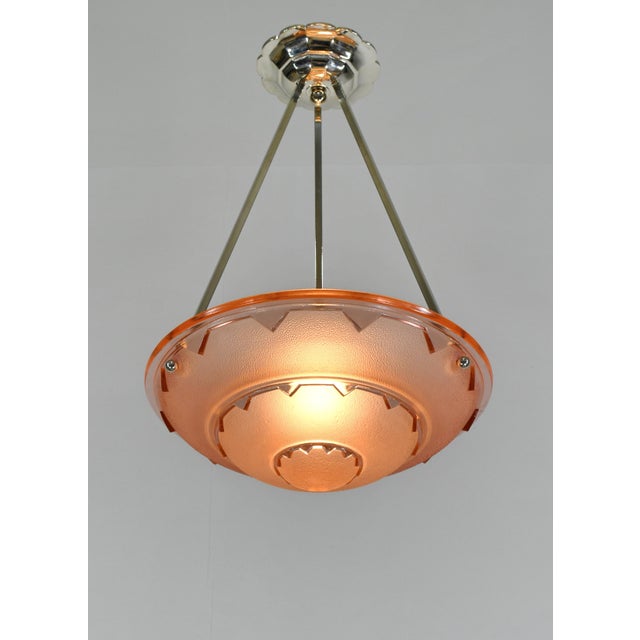 Jean Gauthier (EJG, ezan) A French 1930s art deco hanging fixture in nickel plated bronze or solid brass holding a very...