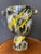 Decorative metal bowl painted by the artist in shades of black, white, and yellow. A sculptural piece with a strong visual...