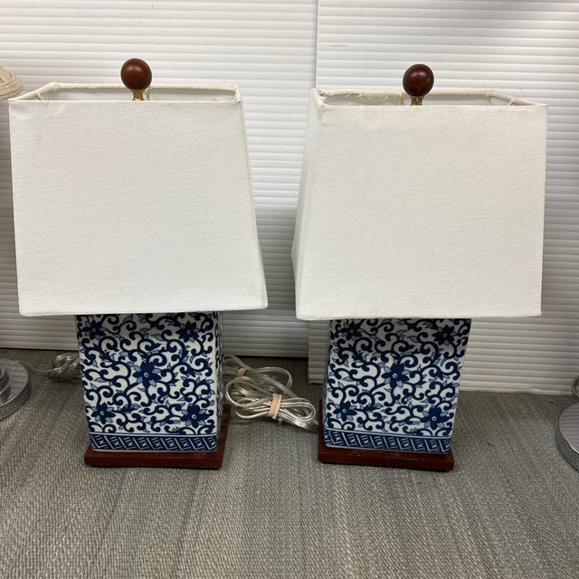 Design Plus Gallery presents a Pair of Blue + White Chinoiserie Table Lamps from Ralph Lauren. The lamps have been Classic...