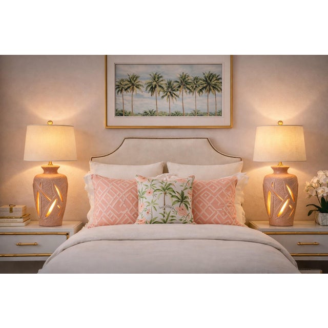 Mobile-Ready Description A dramatic pair of monumental ceramic table lamps featuring illuminated palm frond cutouts,...