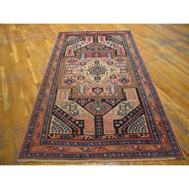 Antique Caucasian rug, measures: 4'7" x 9'0". Antique Caucasian Hallway Runner Wool Rug, Country of Origin: Caucasus,...