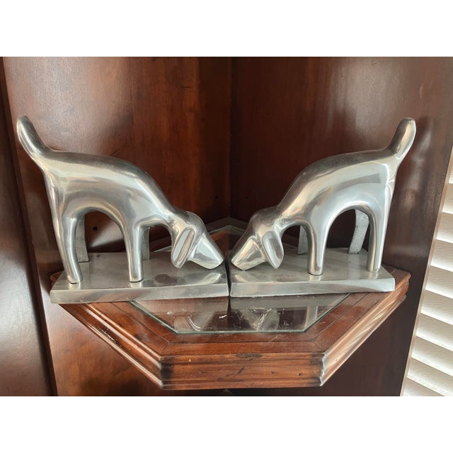 Fabulous pair of mid 20th century dog bookends. They look like they’re made from some kind of chrome. They each measure...
