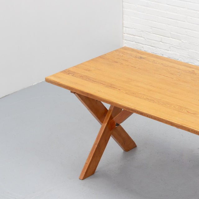 Solid pine dining table designed by Ate van Apeldoorn for Houtwerk Hattem. The construction is defined by a strong X-base,...