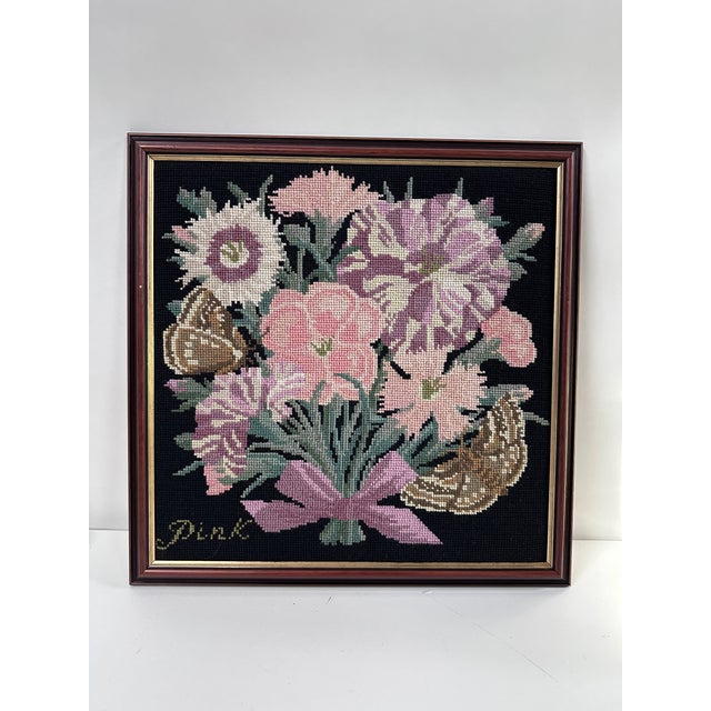 Discover the enchanting beauty of the Framed Floral Needlepoint, a show-stopping piece from the Elizabeth Bradley...