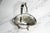 An elegant example of early 20th-century American silverplate craftsmanship, this circa 1920 fruit basket by Wilcox...