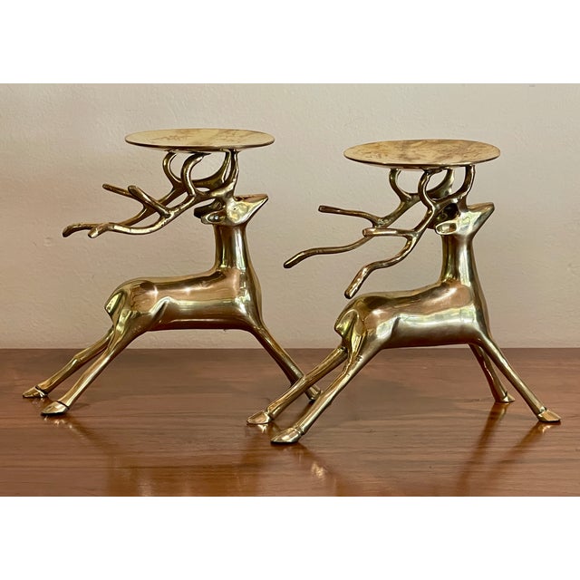 Brilliant pair of vintage brass stag pillar candle holders. Could they also hold your jewelry or keys, or add a bit of...