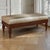 Elegant in form and beautifully executed, this French Louis XVI style bench is crafted in mahogany with a broad...