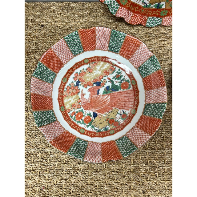 Beautiful Japanese plate set. Comes with two bowls and one large platter. no chips or cracks.