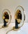 A pair of chic round sconces Estiluz Spain. They are made of a beautiful and heavy quality glass and brass and have a...