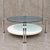 Rare coffee table / solid steel with a low free standing table / 1980s .testament--apollo-down-carrot:hover .hover-fill {...