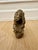 The Story Acquired from the estate of a well-traveled collector, this authentic Nomoli stone figure is a rare piece of...