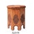 This is an octagon shape side table in the brown color finish. The body and top have oriental geometric floral relief...
