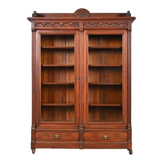 Herter Brothers Style Antique Eastlake Victorian Carved Walnut Bookcase, Circa 1880s For Sale