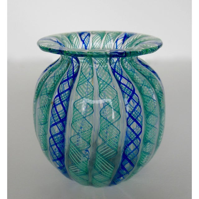 Vintage: C.1960's Italian, hand-blown, Murano by Fratelli Toso, a "Lattacino," ribbon pattern, in a Bulbous shaped,...