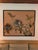 This beautiful large brass floral sculpture is framed in black with a beige cloth background, and hangs from a standard...