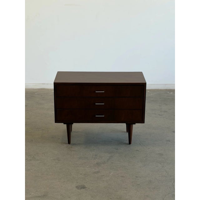 W32 D16 H24 This item has been fully restored in a deep walnut stain featuring original hardware, wide smooth sliding...
