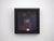 In "The Big Mirror 2," a figure emerges from a dark, atmospheric background, illuminated softly to reveal subtle features...