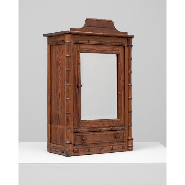 This 1900s French mini faux bamboo armoire is a charming example of the timeless appeal of faux bamboo furniture. Crafted...