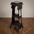 A refined and eclectic pedestal column étagère with shelves in finely carved solid wood, a valuable centerpiece or corner...