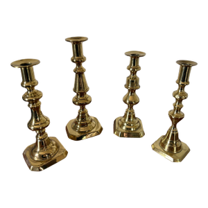 Group of Four English Polished Brass Candlesticks Different Sizes, 19th Century