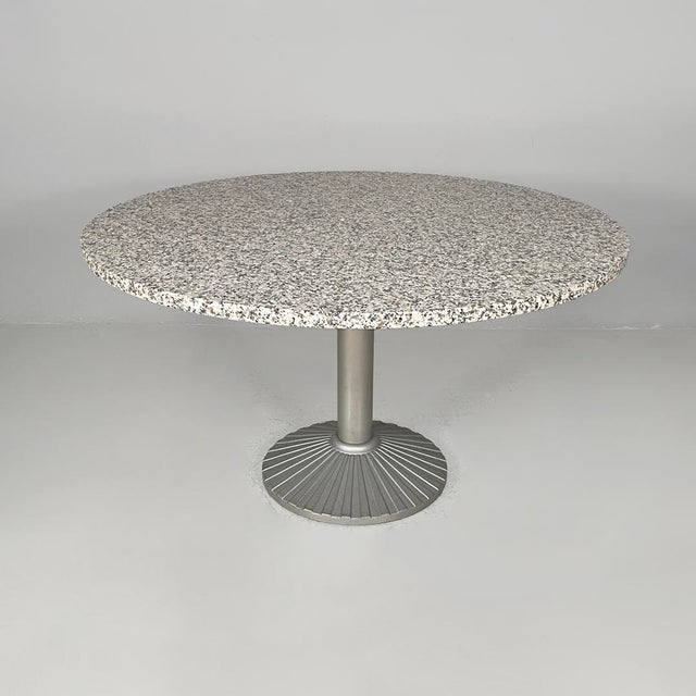 Italian modern dining table by Peter Noever for Zanotta, 1970s Dining table with a large round granite top. The structure...