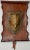 We are offering a vintage reproduction of a bronze shield mounted on a rustic leather scroll. The leather has rolled edges...
