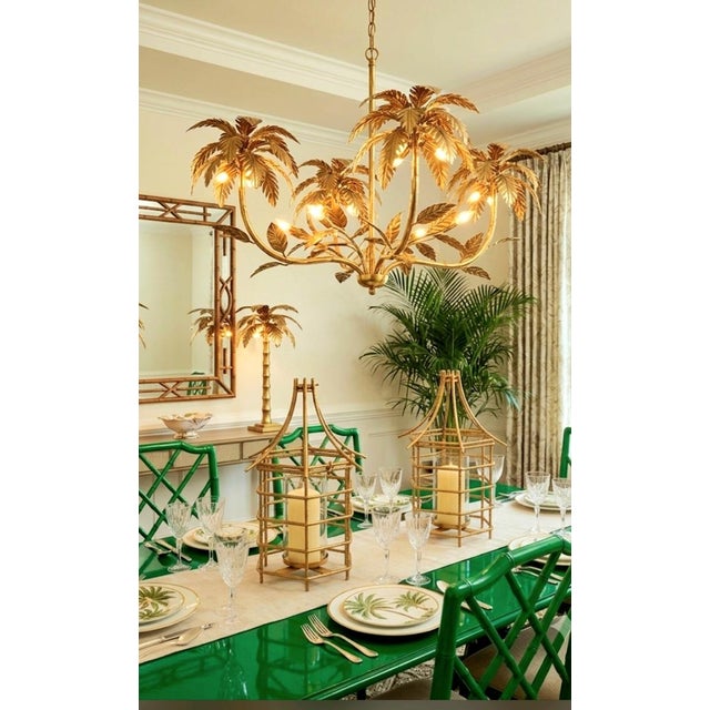 ​Bring a touch of classic Palm Beach style to your space with this striking pair of vintage Hollywood Regency pagoda-style...