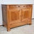 This solid cherry buffet, from the North Nantes region, has two belt drawers with bowl buttons and original functional...
