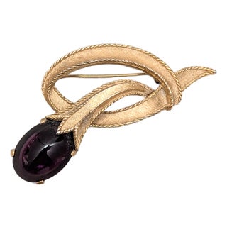 Vintage 1960s Signed Crown Trifari Goldtone Cabochon Faux-Amethyst Brooch For Sale