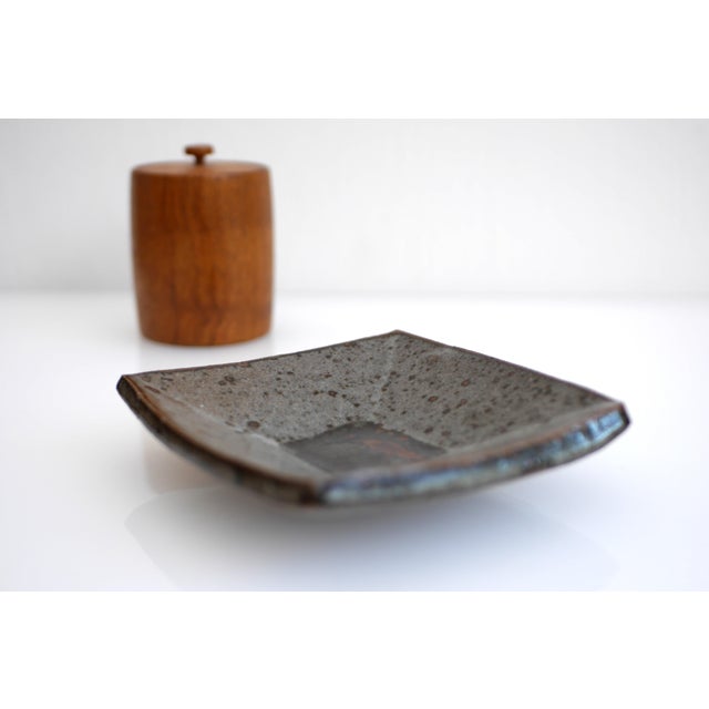 A fantastic mid-century modern dish or plate made by the talented by Janet Leach. The plate is known as "Repeat ware" from...