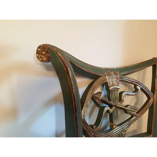 Antique 18th c. Italian green paint & gilt decorated sabre leg side chair. Neoclassical back splat with arrow, bow and...