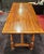 John Widdicomb Trestle Table Long solid wood dining table from John Widdicomb Co. John Widdicomb Co. brass makers label on...