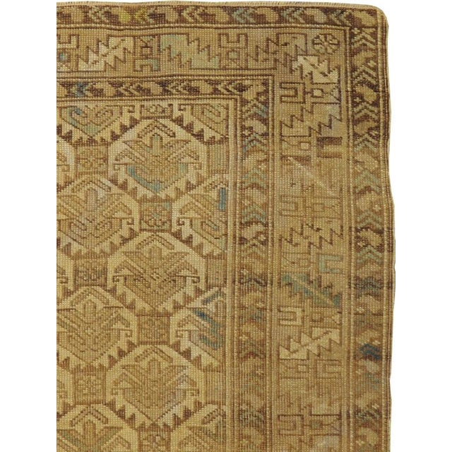 This Early 20th century Caucasian Shirvan rug, is a striking example of the geometric artistry characteristic of the...