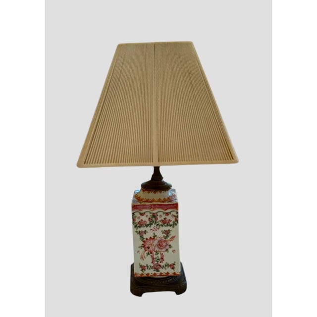 Vintage Chinoiserie 17 1/2” Table Lamp with Famille Rose Handpainted Porcelain Design on Brushed Brass Base. Illuminate...