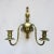 A Pair of Vintage Gilt Metal Wall Sconces; the backplates with two scrolling candle arms supporting candle holders. Each...