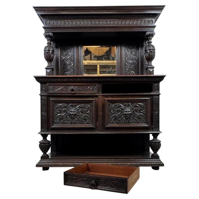 A magnificent 19th-century English Victorian sideboard, finely crafted from oak and distinguished by its imposing mirrored...