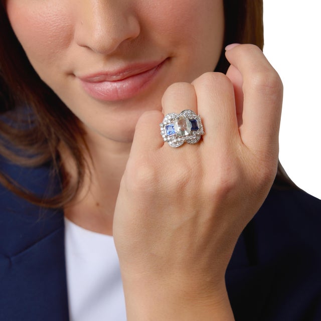 This striking Mid Century cocktail ring showcases a bold 2.08 carat old mine cut diamond, radiating soft antique...